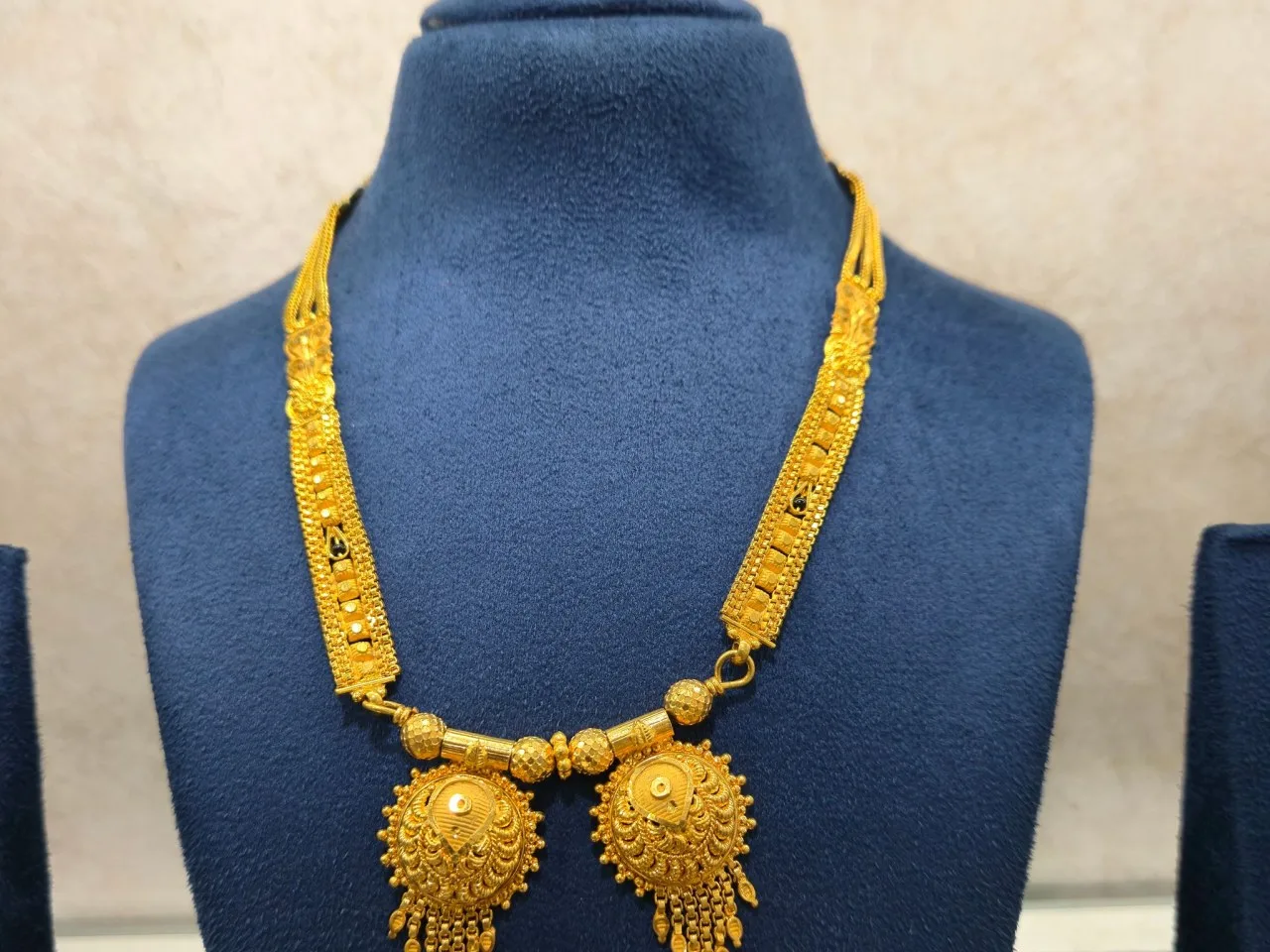 Long haar, twin pendants, one of Sample Jewellers' pieces